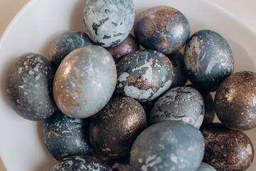 Unusual Easter eggs in blue shades with gilding