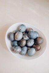 Unusual Easter eggs in blue shades with gilding