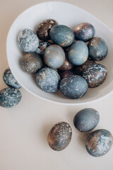 Fototapeta na wymiar Unusual Easter eggs in blue shades with gilding