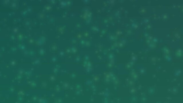 Motion graphics. forest green abstract defocused background, star shape bokeh pattern
