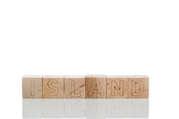 Wooden cubes with letters island on a white background