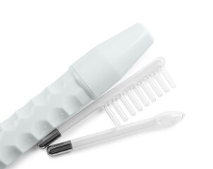 Modern darsonval with nozzles on white background, top view. Microcurrent therapy