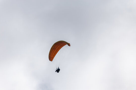 Paraplaners with beautiful blue sky and clounds in the background