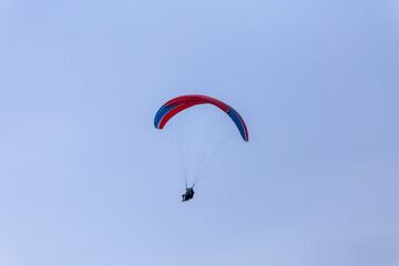 Paraplaners with beautiful blue sky and clounds in the background