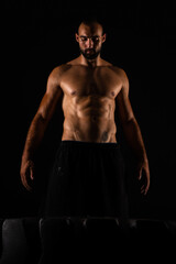 Portrait of guy looking and focusing on the tire