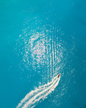 Aerial View Of Speed Boat In Blue Sea Water