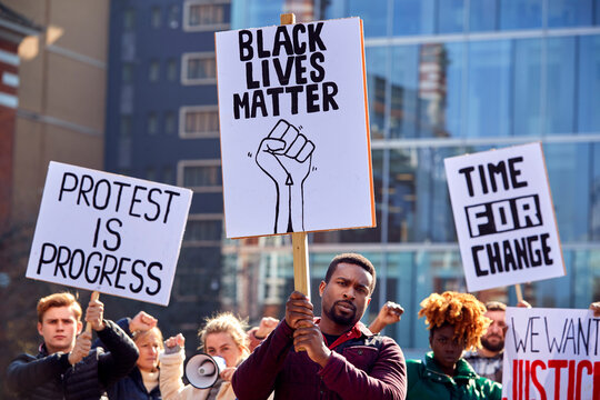 Protestors With Placards On Black Lives Matter Demonstration March Against Racism
