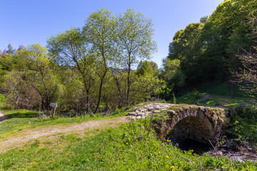 Bridge on the over a river near a footpath