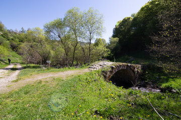 Bridge on the over a river near a footpath