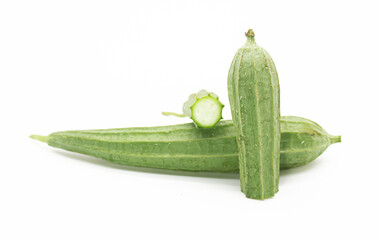 Fresh Angled luffa slice over on white background