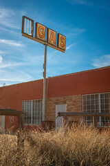 Abandoned Gas station and gas sign