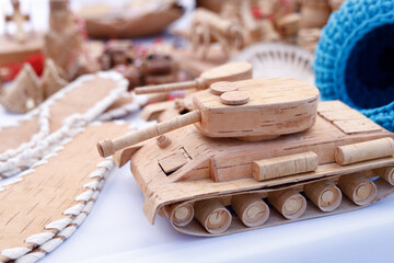 wooden tank made of birch bark at the fair