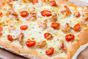 homemade pizza with shrimps and tomatoes