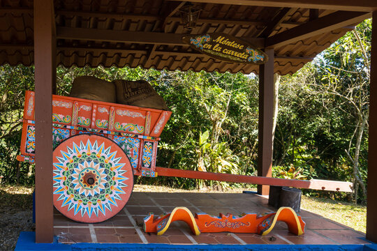 Sarch&iacute;, Costa Rica: Brilliantly painted oxcart (Las carreta), matching ox yoke, burlap sacks of coffee beans from Naranjo canton. Coffee beans from Costa Rica were transported by ox cart.