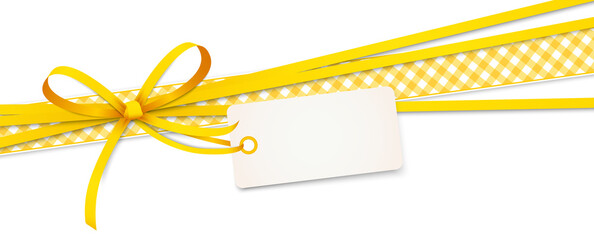 yellow colored ribbon bow with hang tag