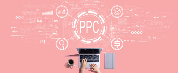 PPC - Pay per click concept with person working with a laptop