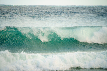 Big and green wave in a sunny day in canary island