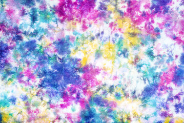 tie dye pattern hand dyed on cotton fabric background.