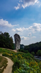 A hiking trail leading to the limestone stack called Hercules bludgeon in the Ojcow National Park near Krakow,Lesser Poland, Poland.Rock formation.Jurassic Krakow-Czestochowa.Pieskowa Skala