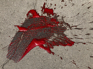 Pool of blood (tomato juice) on asphalt - 492102697