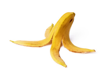Close-up of a banana peel on the ground on a white background. Concept of organic waste