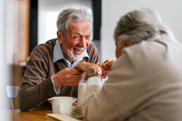 Elderly couple in love. Senior husband and wife hugging and bonding with true emotions