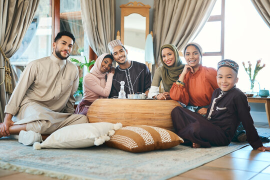 These Are The People Im Grateful For. Shot Of A Young Muslim Family Relaxing Together During Ramadan.