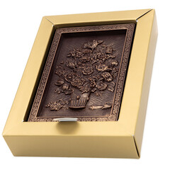 Three-dimensional drawing of flowers on chocolate in a gift box