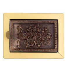 Three-dimensional drawing of flowers on chocolate in a gift box