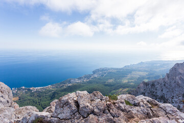 Fototapeta na wymiar Panoramic view of the city of Yalta from the Ai-Petri cliff. Crimean nature. The Republic of Crimea.