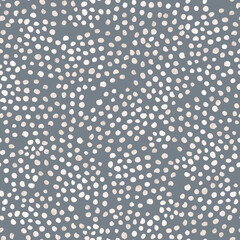 Seamless minimalistic pattern on a light gray background with polka dots. For textiles, wallpaper, wrapping paper, children's clothing, notebook and diary covers, bed linen