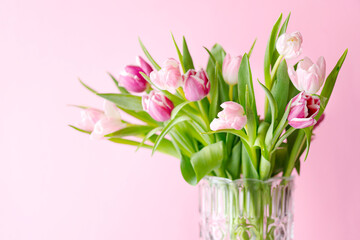 spring tulips on pink background. Greeting card for mothers day