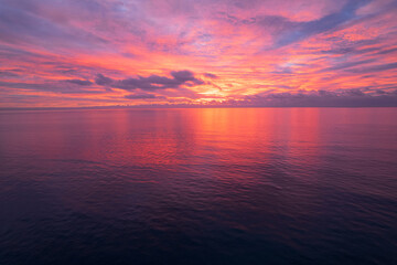 pink and yellow sunset over the ocean