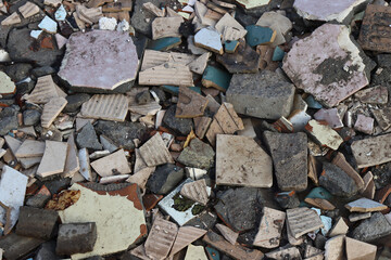 Construction waste, broken ceramic tiles.