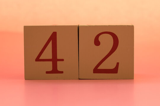 Numbers or dates on wooden cubes, forty-two