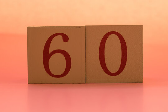 Numbers or dates on wooden cubes, sixty