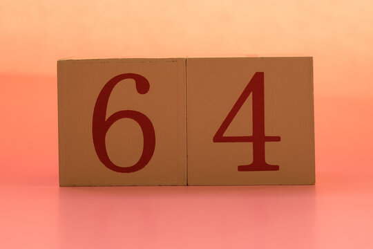 Numbers or dates on wooden cubes, sixty-four