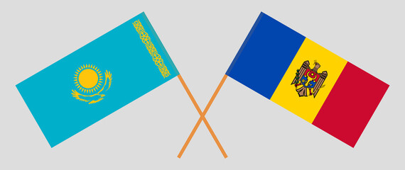 Crossed flags of Kazakhstan and Moldova. Official colors. Correct proportion