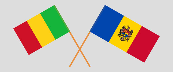 Crossed flags of Mali and Moldova. Official colors. Correct proportion