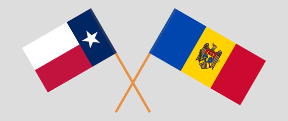 Crossed flags of the State of Texas and Moldova. Official colors. Correct proportion