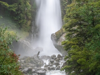 Waterfalls and cascades on scenic road to the Exploradores Glacier ion the slopes of Monte San...