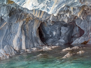 Fototapeta na wymiar Stunning Marble Caves, Marble Chapel, and Marble Cathedral near Puerto Río Tranquilo on the shores of the General Carrera Lake, Chile.