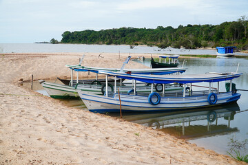 Small harbor for family boats in the Amazon rainforest on the Rio Tapajós river. Village Solimões, Santarém, state of Pará, Brazil.