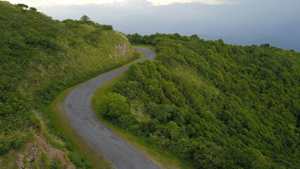 beautiful mountain road in green landscape in northwest Argentina
