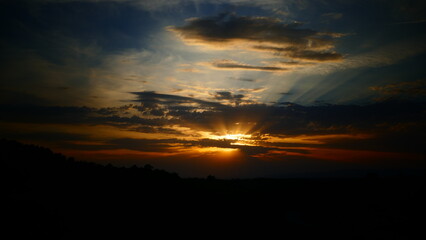 behind the clouds