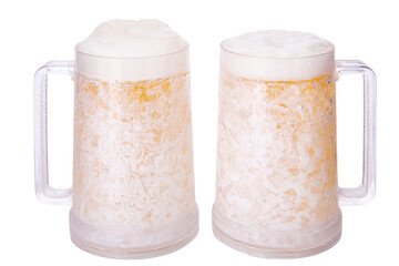 Two full beer mugs with beer and foam and ergonomic handle isolated on white background with copy space