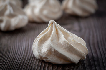 Delicious meringue cookies on the table.