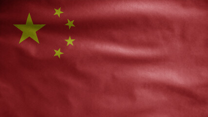 Chinese flag waving on wind. Close up of China banner blowing soft silk