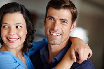 Hold on to love. Cropped shot of an affectionate couple spending time together in their home.