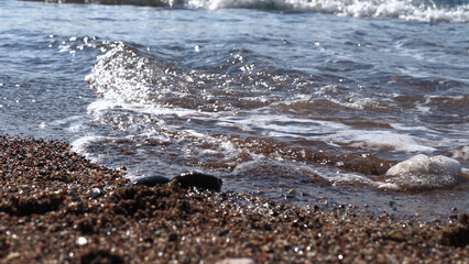 Stone beach on a beautiful sunny beach